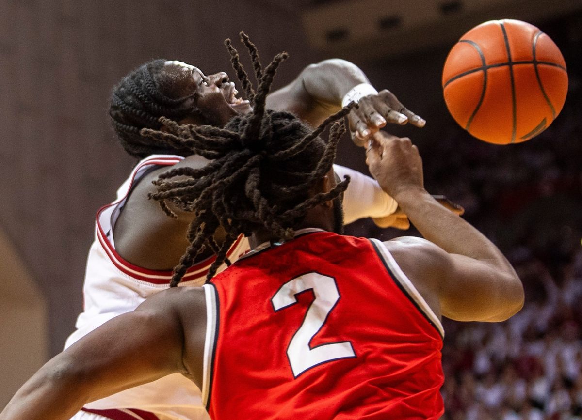 Indiana's Oumar Ballo (11) has the ball knocked away by Ohio State's Bruce Thornton (2) during the Indiana versus Ohio State men's basketball game at Simon Skjodt Assembly Hall on Saturday, March 8, 2025.