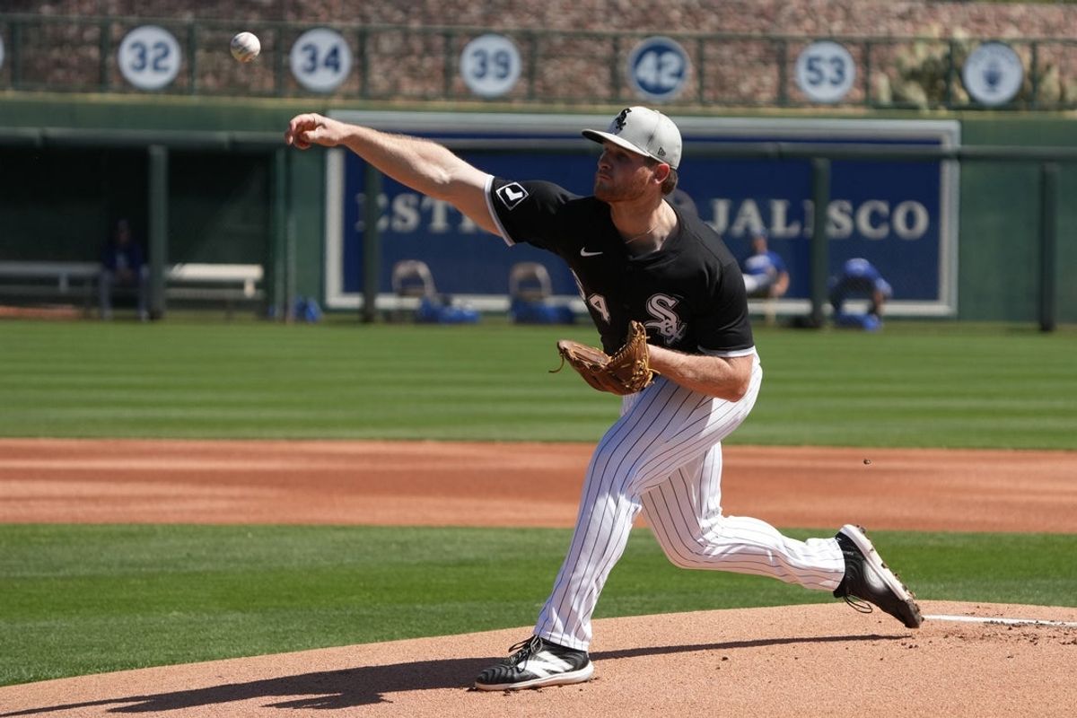 Mar 8, 2025; Phoenix, Arizona, USA; Chicago White Sox pitcher Shane Smith (64) throws against the Los Angeles Dodgers in the first inning at Camelback Ranch-Glendale. Mandatory Credit: Rick Scuteri-Imagn Images