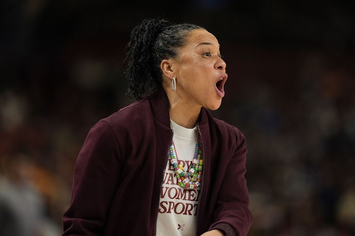 Mar 8, 2025; Greenville, SC, USA; South Carolina Gamecocks head coach Dawn Staley yells to her team  during the first half against the Oklahoma Sooners at Bon Secours Wellness Arena. Mandatory Credit: Jim Dedmon-Imagn Images