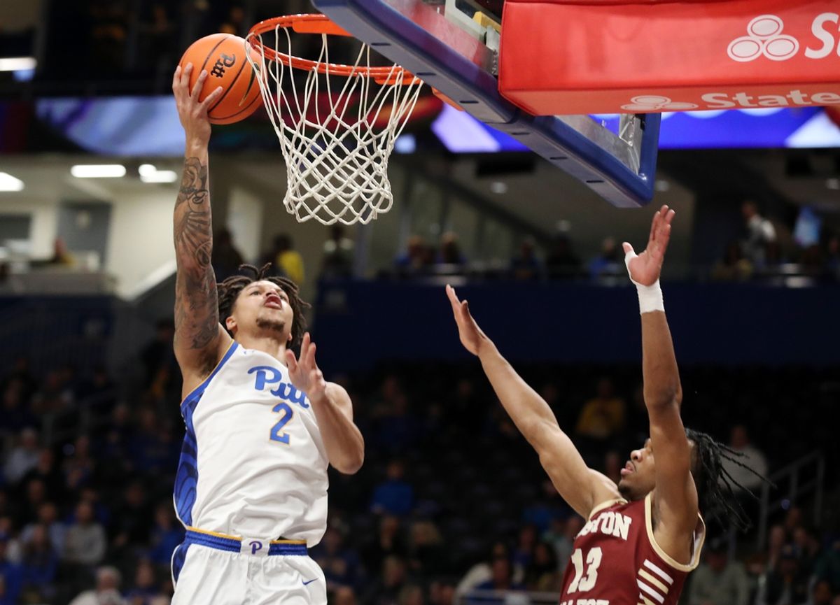 Mar 8, 2025; Pittsburgh, Pennsylvania, USA;  Pittsburgh Panthers forward Cameron Corhen (2) shoots against Boston College Eagles guard Donald Hand Jr. (13) during the first half at the Petersen Events Center. Mandatory Credit: Charles LeClaire-Imagn Images