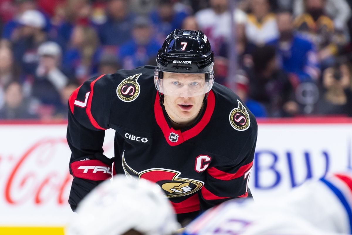 Mar 8, 2025; Ottawa, Ontario, CAN;  Ottawa Senators left wing Brady Tkachuk (7) gets in position for a faceoff in the first period against the New York Rangers at the Canadian Tire Centre. Mandatory Credit: Marc DesRosiers-Imagn Images
