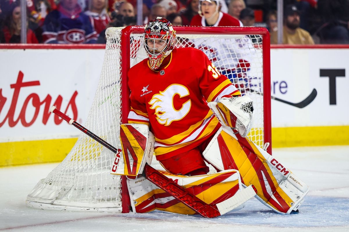 Mar 8, 2025; Calgary, Alberta, CAN; Calgary Flames goaltender Dustin Wolf (32) guards his net against the Montreal Canadiens during the first period at Scotiabank Saddledome. Mandatory Credit: Sergei Belski-Imagn Images