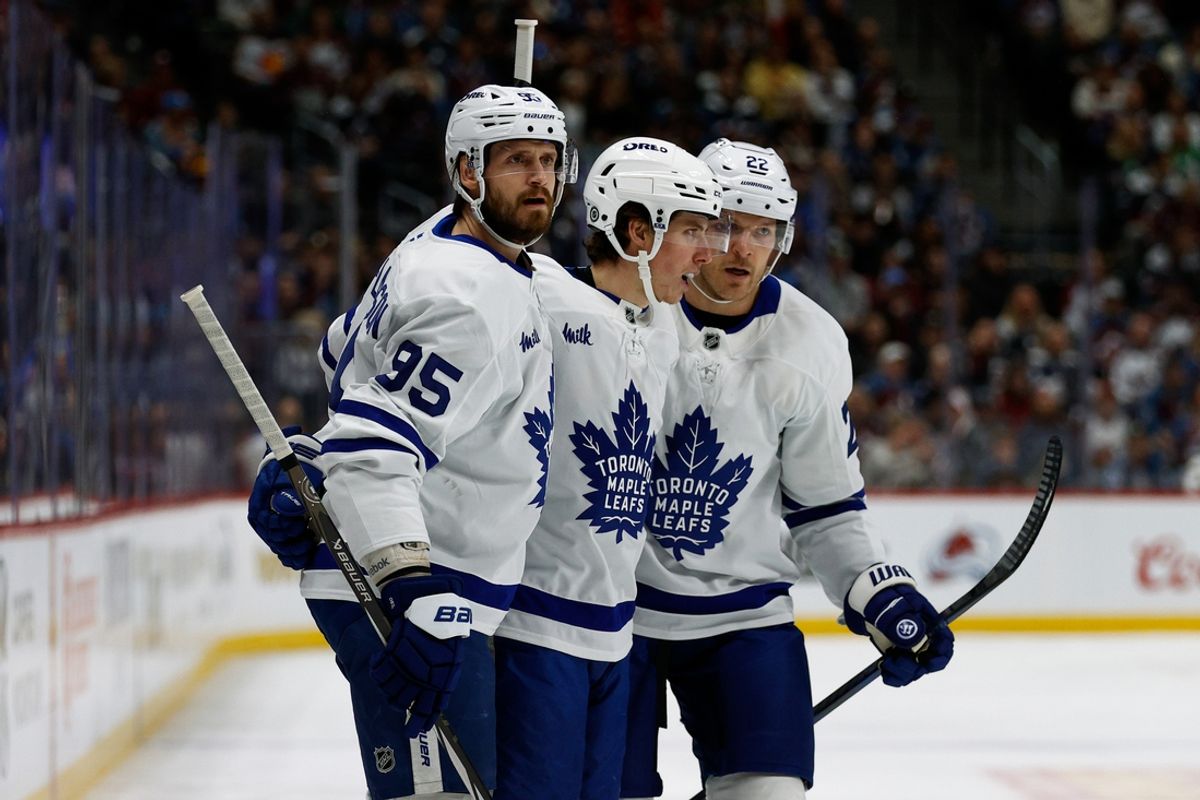 Mar 8, 2025; Denver, Colorado, USA; Toronto Maple Leafs right wing Mitch Marner (16) celebrates his goal with defenseman Oliver Ekman-Larsson (95) and defenseman Jake McCabe (22) in the first period against the Colorado Avalanche at Ball Arena. Mandatory Credit: Isaiah J. Downing-Imagn Images