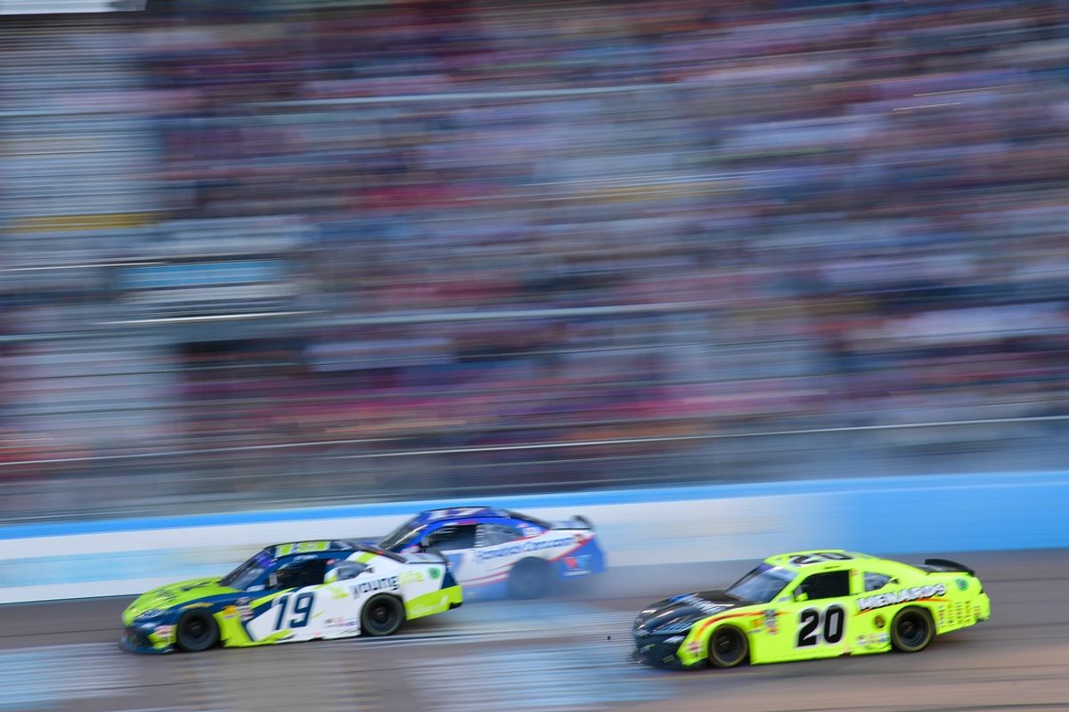 Mar 8, 2025; Avondale, Arizona, USA; NASCAR Xfinity Series driver Aric Almirola (19) finishes ahead of driver Alex Bowman (17) and driver Brandon Jones (20) for the victory of the GovX 200 at Phoenix Raceway. Mandatory Credit: Gary A. Vasquez-Imagn Images