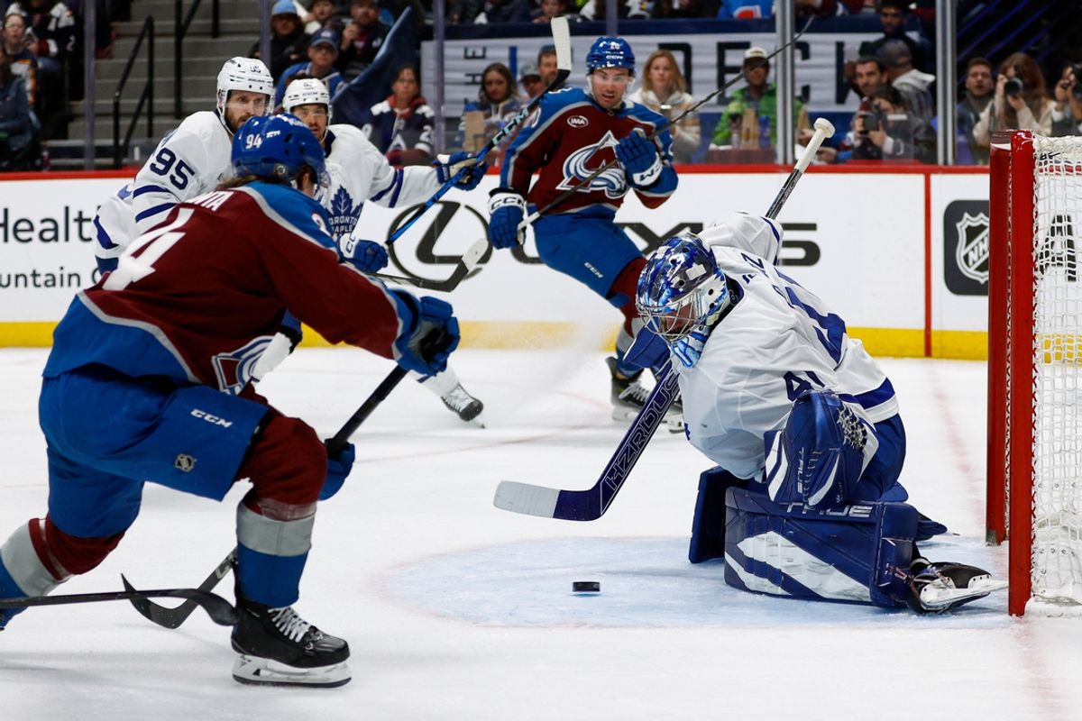 Mar 8, 2025; Denver, Colorado, USA; Colorado Avalanche left wing Joel Kiviranta (94) scores against Toronto Maple Leafs goaltender Anthony Stolarz (41) in the second period at Ball Arena. Mandatory Credit: Isaiah J. Downing-Imagn Images