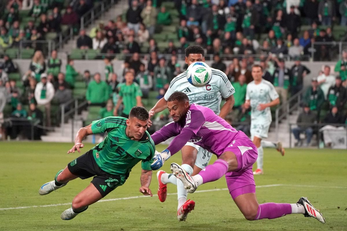 Mar 8, 2025; Austin, Texas, USA; Austin FC forward Myrto Uzuni (10) kicks against Colorado Rapids goalkeeper Zack Steffen (1) during the first half at Q2 Stadium. Mandatory Credit: Dustin Safranek-Imagn Images