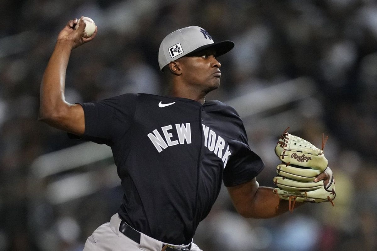Mar 8, 2025; West Palm Beach, Florida, USA;  New York Yankees pitcher Yerry De Los Santos (73) pitches in the fourth inning against the Houston Astros at CACTI Park of the Palm Beaches. Mandatory Credit: Jim Rassol-Imagn Images