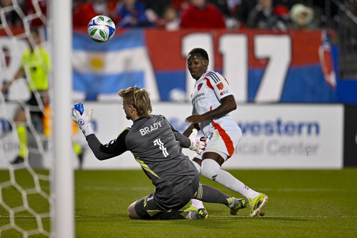 Mar 8, 2025; Frisco, Texas, USA; Chicago Fire goalkeeper Chris Brady (1) stops a shot by FC Dallas midfielder Anderson Julio (11) during the first half at Toyota Stadium. Mandatory Credit: Jerome Miron-Imagn Images