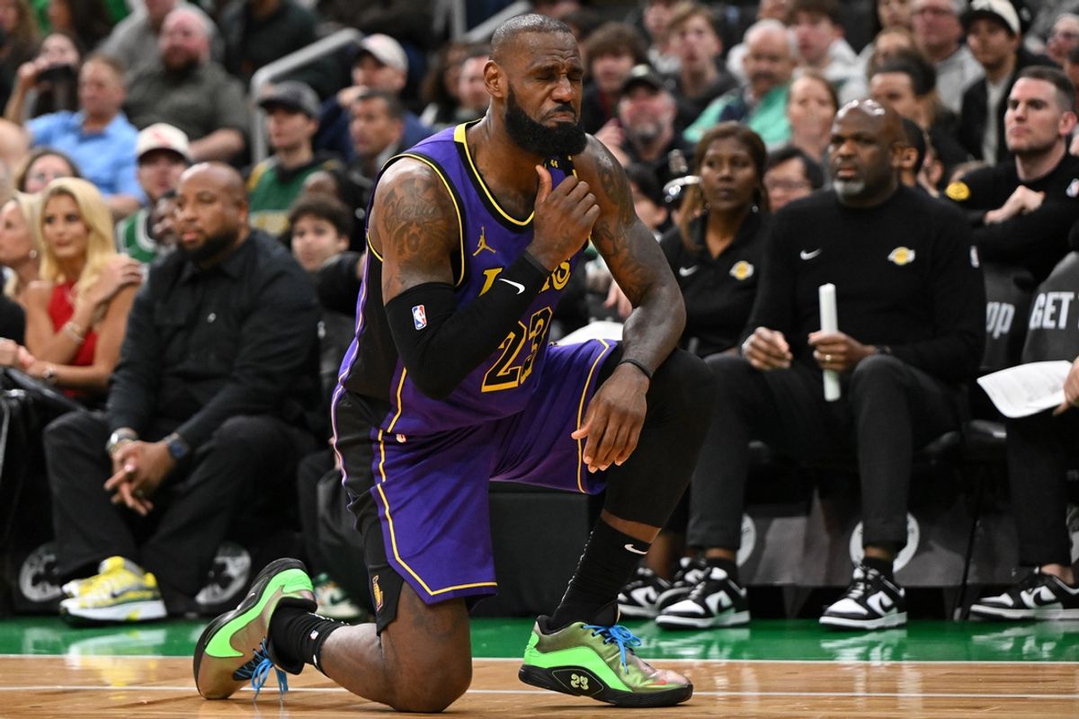 Mar 8, 2025; Boston, Massachusetts, USA; Los Angeles Lakers forward LeBron James (23) reacts after being fouled by Boston Celtics forward Jayson Tatum (not seen) during the fourth quarter at the TD Garden. Mandatory Credit: Brian Fluharty-Imagn Images