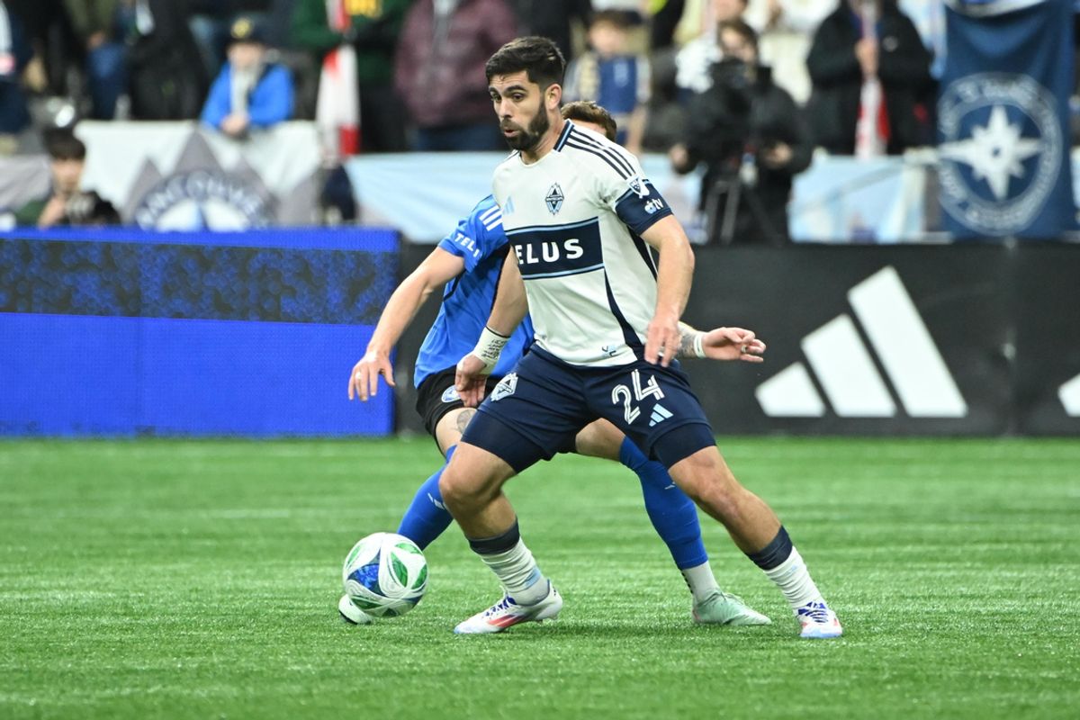 Mar 8, 2025; Vancouver, British Columbia, CAN;  Vancouver Whitecaps FC forward Brian White (24) dribbles the against CF Montreal during the first half at BC Place. Mandatory Credit: Simon Fearn-Imagn Images