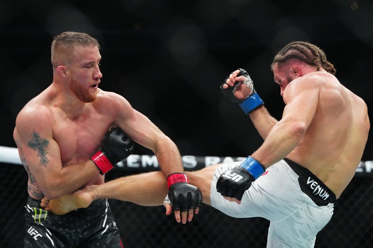 Mar 8, 2025; Las Vegas, Nevada, USA; Justin Gaethje (red gloves) fights Rafael Fiziev (blue gloves) during UFC 313 at T-Mobile Arena. Mandatory Credit: Stephen R. Sylvanie-Imagn Images