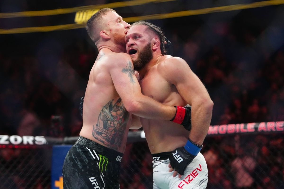 Mar 8, 2025; Las Vegas, Nevada, USA; Justin Gaethje (red gloves) reacts after fighting Rafael Fiziev (blue gloves) during UFC 313 at T-Mobile Arena. Mandatory Credit: Stephen R. Sylvanie-Imagn Images