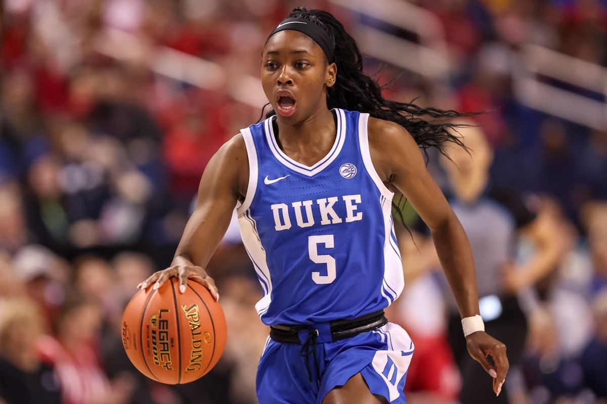 Mar 9, 2025; Greensboro, NC, USA;  Duke Blue Devils guard Oluchi Okananwa (5) brings the ball up court during the first quarter against NC State Wolfpack at First Horizon Coliseum. Mandatory Credit: Cory Knowlton-Imagn Images