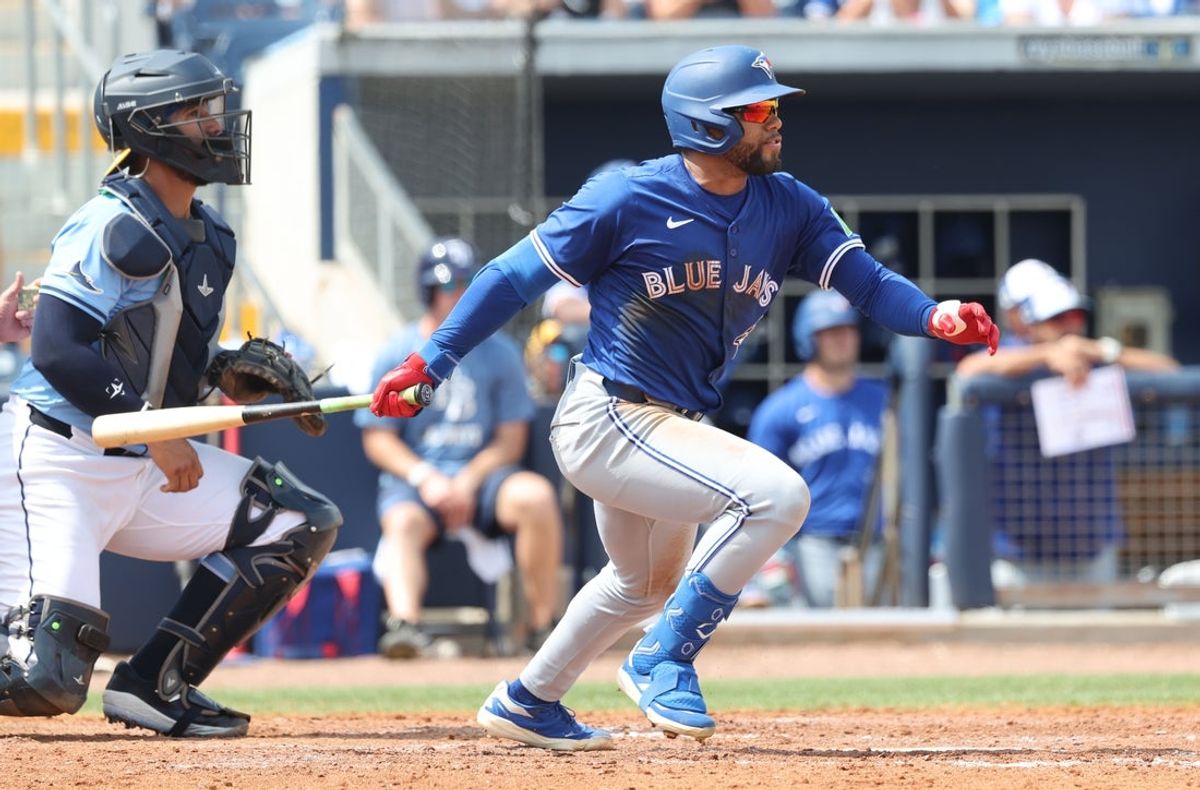 Mar 9, 2025; Port Charlotte, Florida, USA; Toronto Blue Jays outfielder Steward Berroa (37) hits a RBI single during the sixth inning against the Tampa Bay Rays at Charlotte Sports Park. Mandatory Credit: Kim Klement Neitzel-Imagn Images