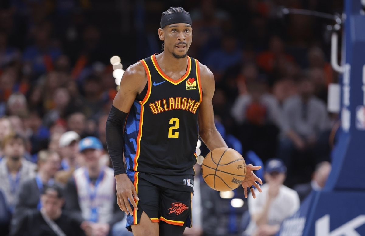 Mar 9, 2025; Oklahoma City, Oklahoma, USA; Oklahoma City Thunder guard Shai Gilgeous-Alexander (2) dribbles down the court against the Denver Nuggets during the second half at Paycom Center. Mandatory Credit: Alonzo Adams-Imagn Images