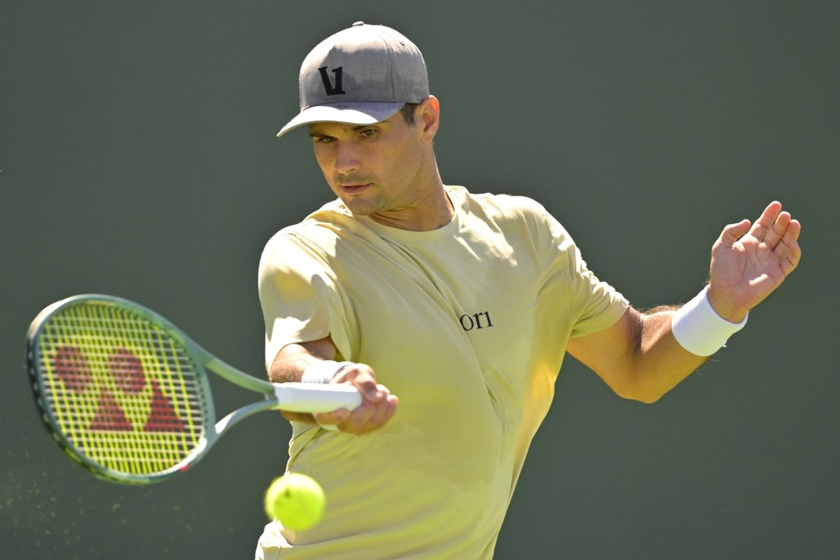 Mar 9, 2025; Indian Wells, CA, USA;  Marcos Giron (USA) hits a shot against Alexei Popyrin (not pictured) in the third round of the BNP Paribas Open at the Indian Well Tennis Garden. Mandatory Credit: Jayne Kamin-Oncea-Imagn Images