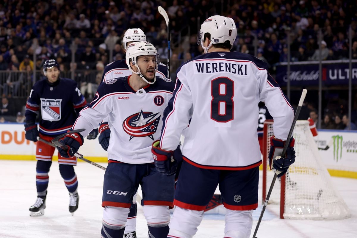 Mar 9, 2025; New York, New York, USA; Columbus Blue Jackets right wing Justin Danforth (17) celebrates his goal against the New York Rangers with defenseman Zach Werenski (8) during the first period at Madison Square Garden. Mandatory Credit: Brad Penner-Imagn Images