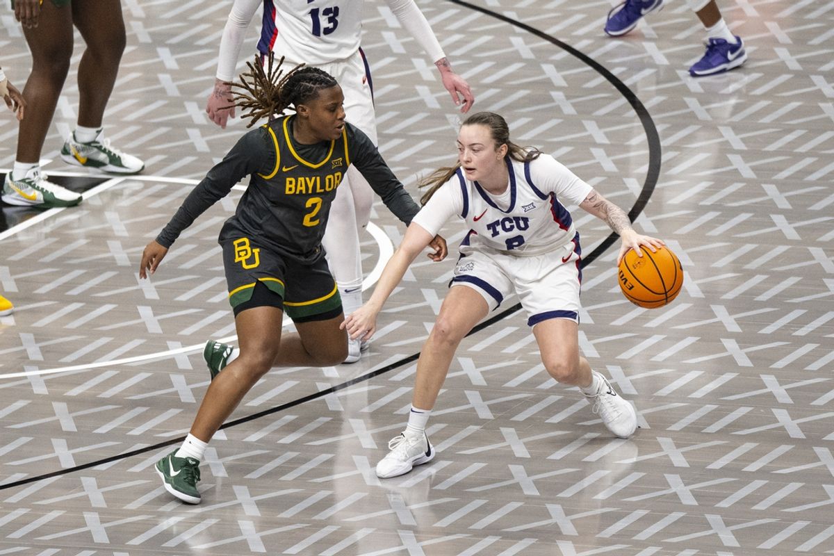 Mar 9, 2025; Kansas City, MO, USA; TCU Horned Frogs guard Madison Conner (2) handles the ball while defended by Baylor Lady Bears guard Yaya Felder (2) during the second half at T-Mobile Center. Mandatory Credit: Amy Kontras-Imagn Images