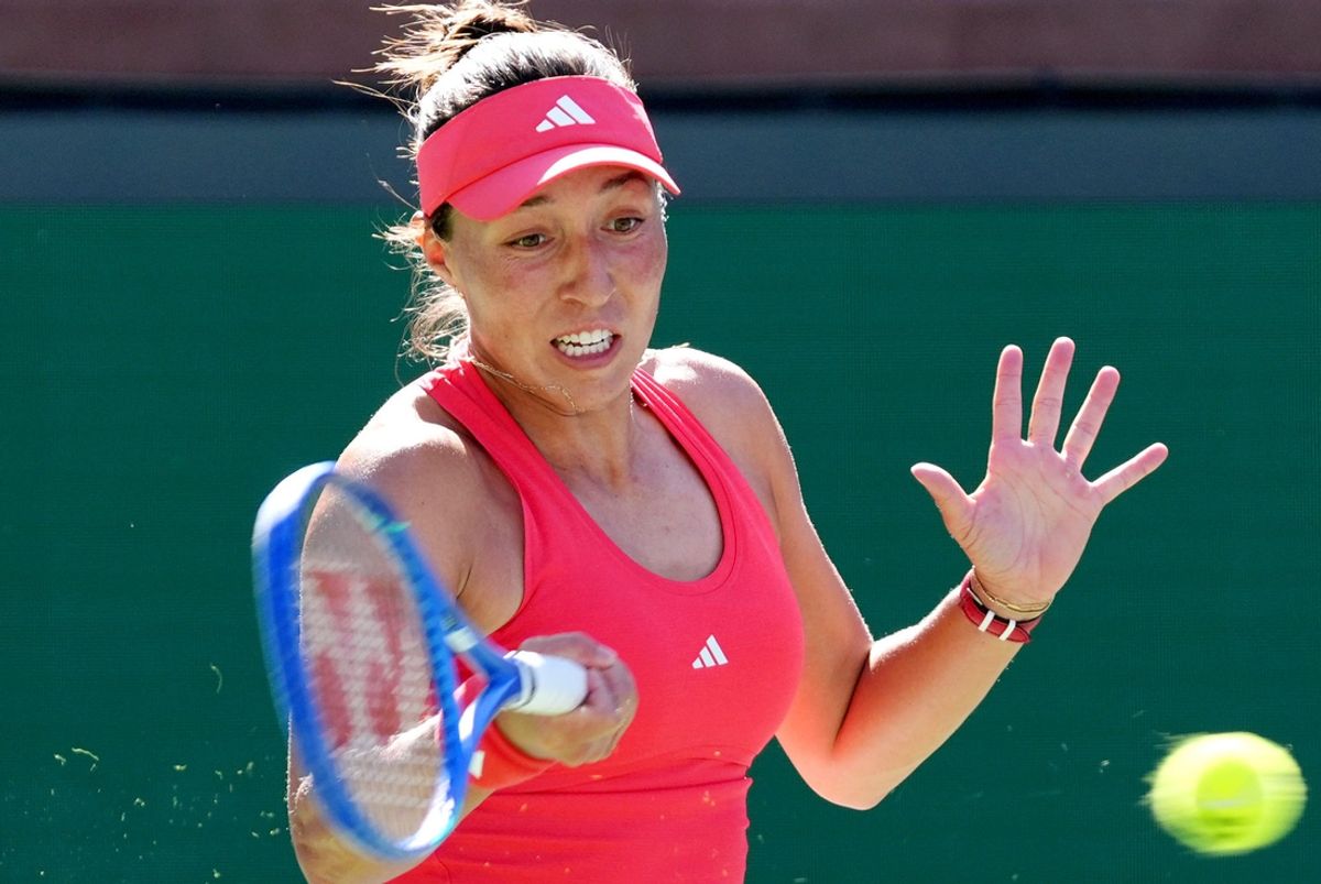 Jessica Pegula returns to Xinyu Wang during their round three match on Stadium 2 at the BNP Paribas Open in Indian Wells, Calif., on Sunday, March 9, 2025.