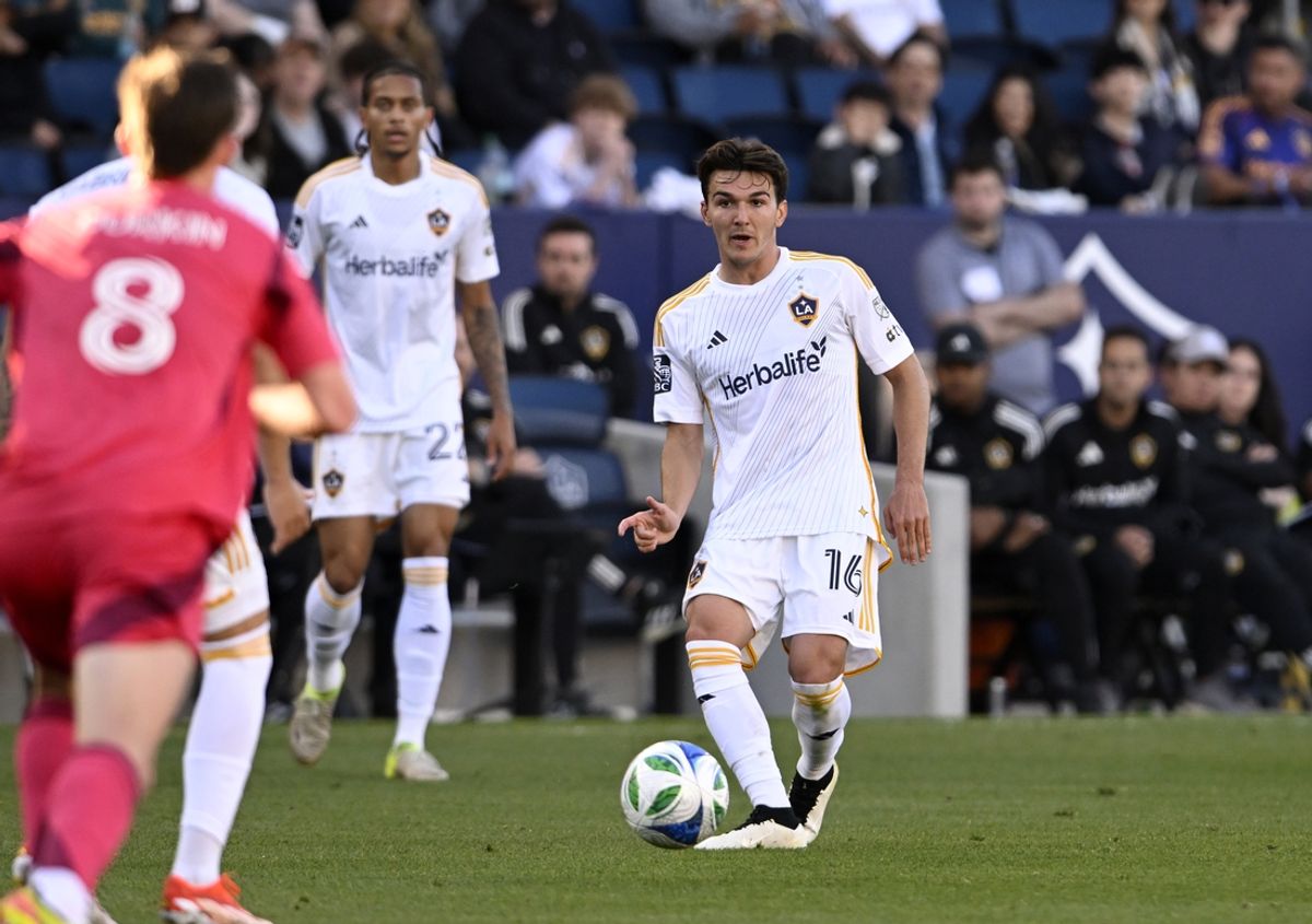 Mar 9, 2025; Carson, California, USA;  Los Angeles Galaxy midfielder Isaiah Parente (16) passes the ball during the second half against St. Louis CITY SC at Dignity Health Sports Park. Mandatory Credit: Alex Gallardo-Imagn Images