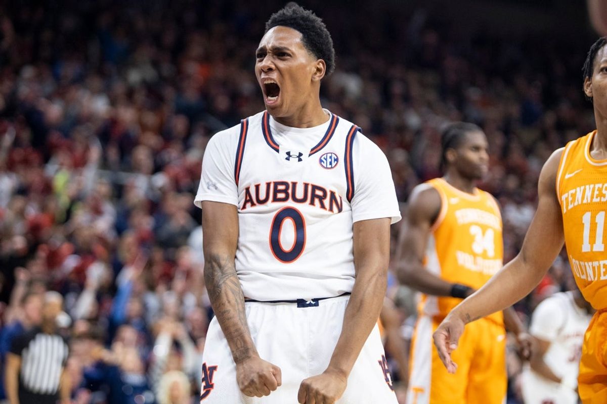 Auburn Tigers guard Tahaad Pettiford (0) celebrates his and-one basket as Auburn Tigers take on Tennessee Volunteers at Neville Arena in Auburn, Ala., on Saturday, Jan. 25, 2025. Auburn Tigers defeated Tennessee Volunteers 53-51.