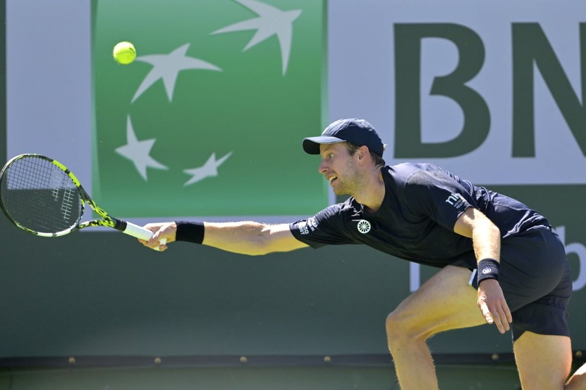 Mar 9, 2025; Indian Wells, CA, USA;  Botic Van De Zandschulp (NED)hits a shot against Francisco Cerundolo (not pictured) in the third round during the BNP Paribas Open at the Indian Well Tennis Garden. Mandatory Credit: Jayne Kamin-Oncea-Imagn Images
