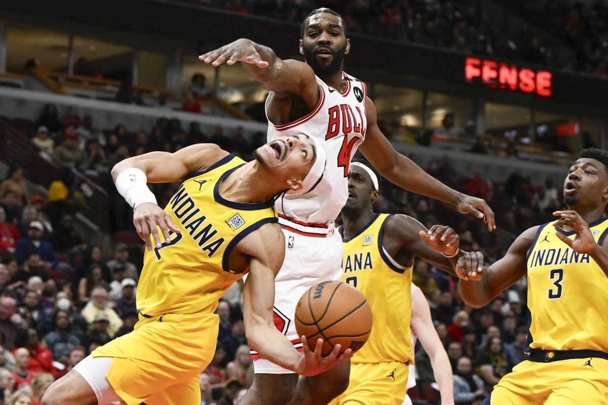 Mar 10, 2025; Chicago, Illinois, USA; Chicago Bulls forward Patrick Williams (44) defends against Indiana Pacers guard Andrew Nembhard (2) during the first half  at United Center. Mandatory Credit: Matt Marton-Imagn Images