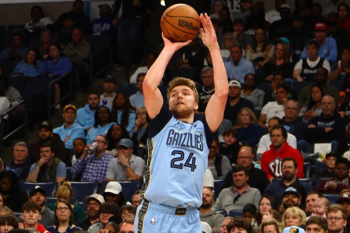 Mar 10, 2025; Memphis, Tennessee, USA; Memphis Grizzlies guard Cam Spencer (24) shoots for three during the second quarter against the Phoenix Suns at FedExForum. Mandatory Credit: Petre Thomas-Imagn Images