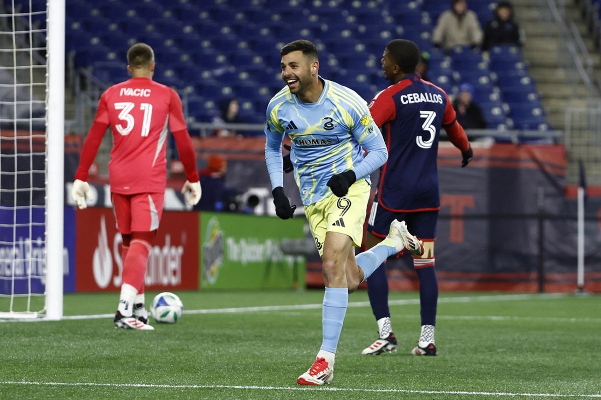 Mar 8, 2025; Foxborough, Massachusetts, USA; Philadelphia Union forward Tai Baribo (9) smiles as he heads for teammates after scoring on New England Revolution goalkeeper Aljaz Ivacic (31) during the second half at Gillette Stadium. Mandatory Credit: Winslow Townson-Imagn Images