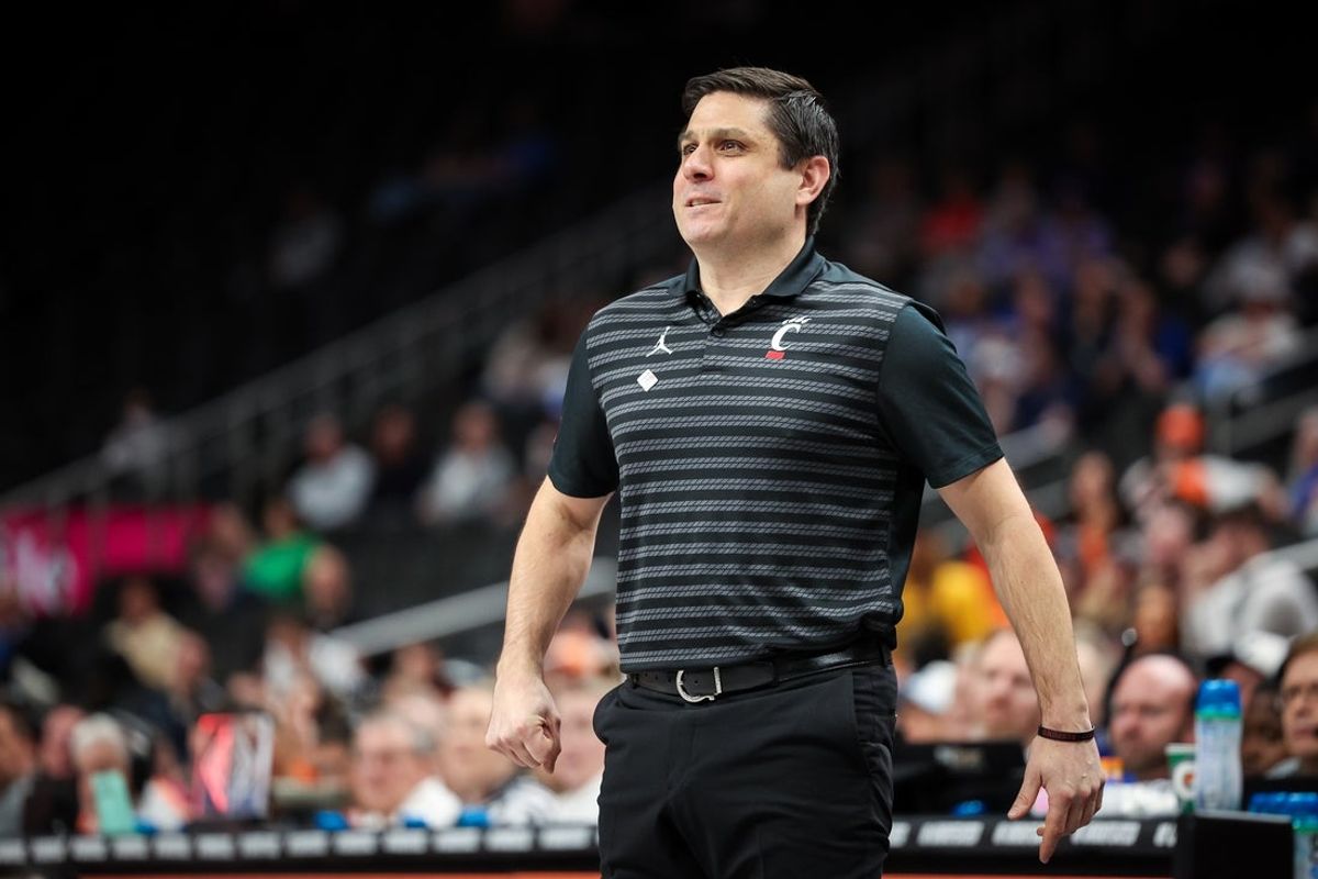 Mar 11, 2025; Kansas City, MO, USA; Cincinnati Bearcats coach Scott Satterfield reacts to game play against the Oklahoma State Cowboys during the first half at T-Mobile Center. Mandatory Credit: William Purnell-Imagn Images