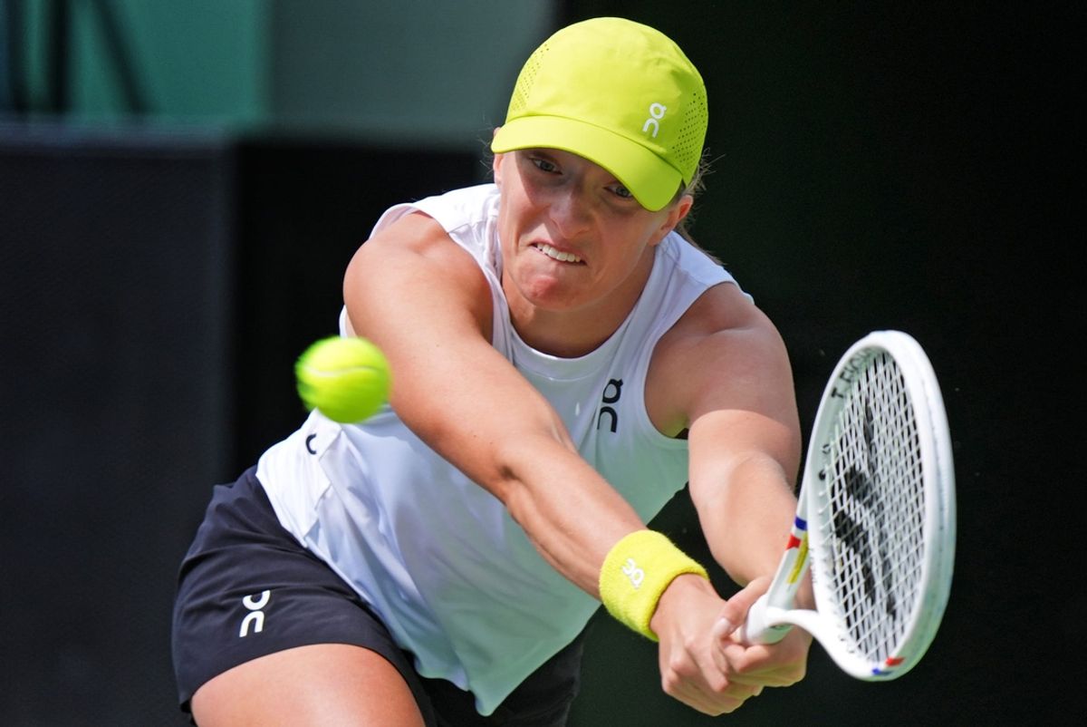 Iga Swiatek returns to Karolina Muchova on Stadium 1 during their round of 16 match at the BNP Paribas Open in Indian Wells, Calif., on Tuesday, March 11, 2025.