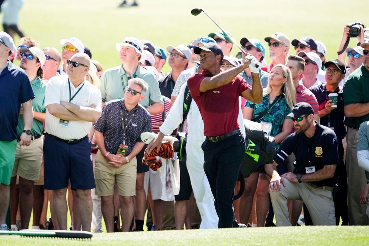 Tiger Woods plays his second shot on No. 8 during the final round of the Masters Tournament.