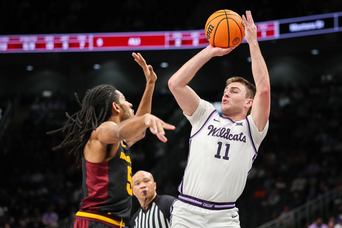 Mar 11, 2025; Kansas City, MO, USA; Kansas State Wildcats guard Brendan Hausen (11) shoots the ball over Arizona State Sun Devils guard Amier Ali (5) during the first half at T-Mobile Center. Mandatory Credit: William Purnell-Imagn Images