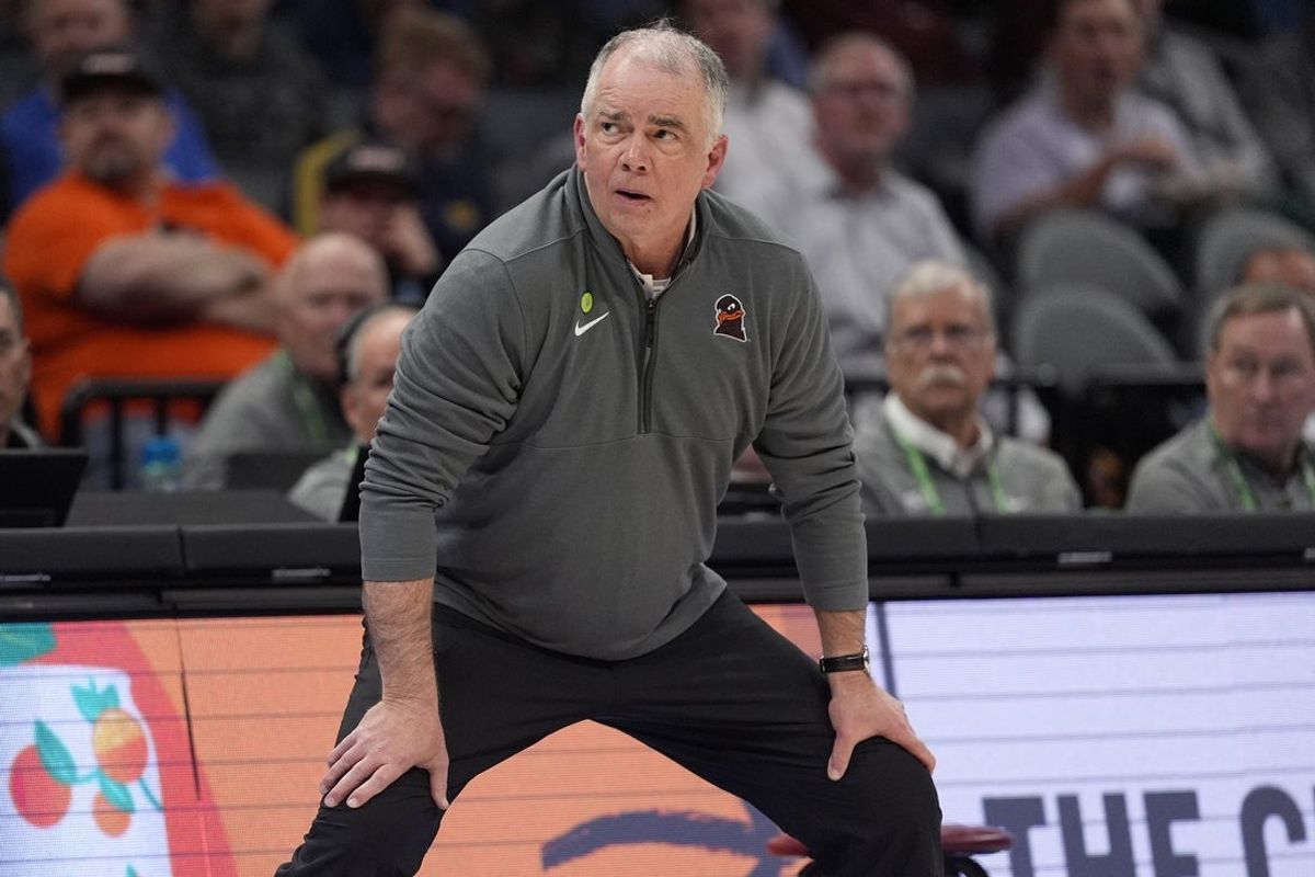 Mar 11, 2025; Charlotte, NC, USA; Virginia Tech Hokies head coach Mike Young during OT against the California Golden Bears at Spectrum Center. Mandatory Credit: Jim Dedmon-Imagn Images