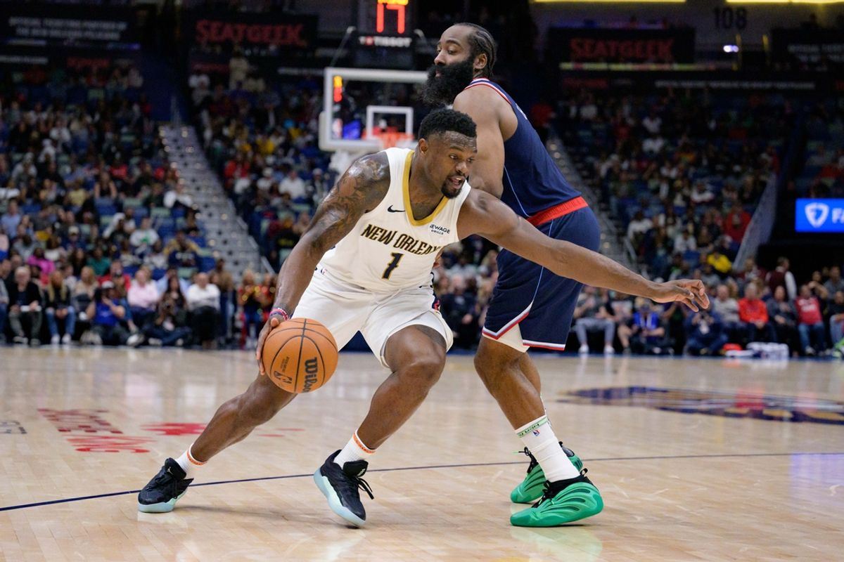 Mar 11, 2025; New Orleans, Louisiana, USA; New Orleans Pelicans forward Zion Williamson (1) dribbles around Los Angeles Clippers guard James Harden (1) during the first half at Smoothie King Center. Mandatory Credit: Matthew Hinton-Imagn Images