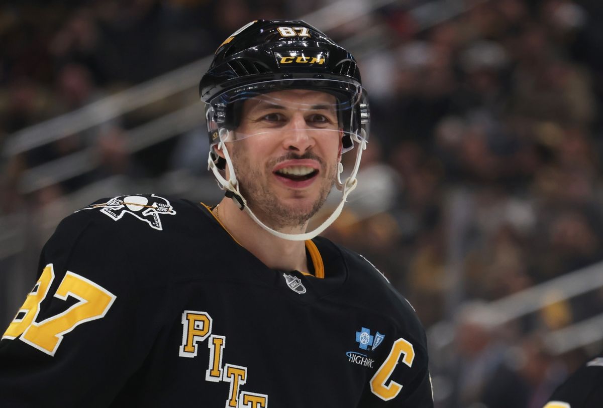 Mar 11, 2025; Pittsburgh, Pennsylvania, USA;  Pittsburgh Penguins center Sidney Crosby (87) smiles on the ice against the Vegas Golden Knights during the third period at PPG Paints Arena. Mandatory Credit: Charles LeClaire-Imagn Images