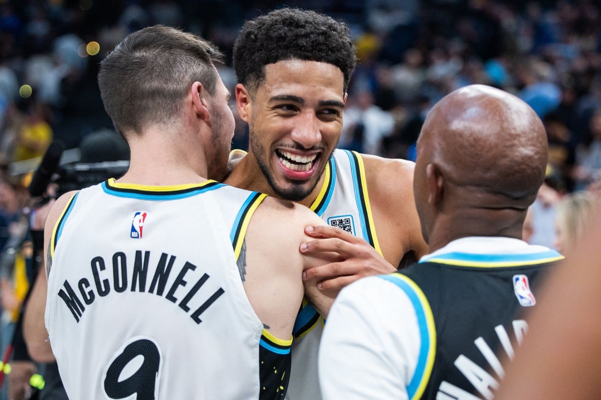 Mar 11, 2025; Indianapolis, Indiana, USA; Indiana Pacers guard Tyrese Haliburton (0) and  guard T.J. McConnell (9) celebrate the win over Milwaukee Bucks at Gainbridge Fieldhouse. Mandatory Credit: Trevor Ruszkowski-Imagn Images