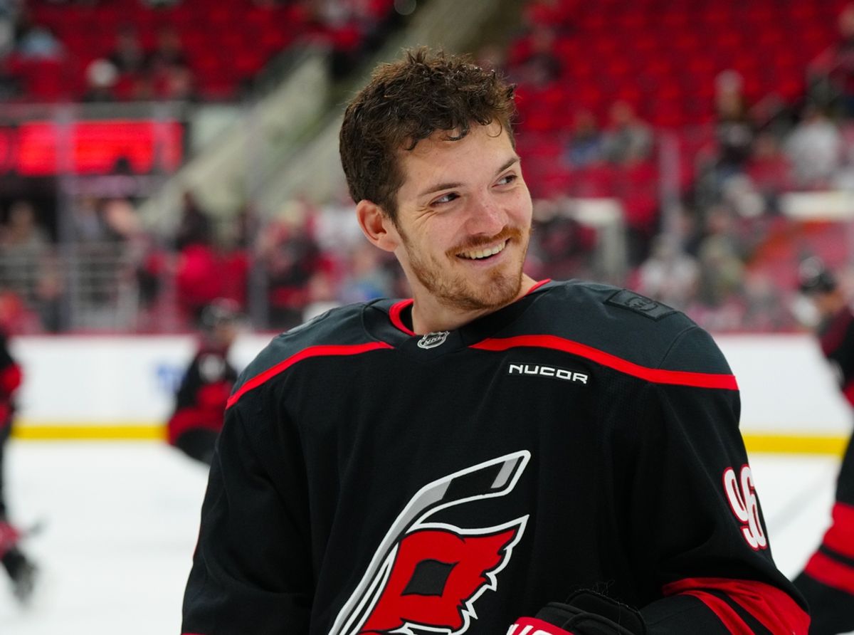 Mar 11, 2025; Raleigh, North Carolina, USA;  Carolina Hurricanes center Jack Roslovic (96) smiles during the warmups before the game against the Tampa Bay Lightning at Lenovo Center. Mandatory Credit: James Guillory-Imagn Images
