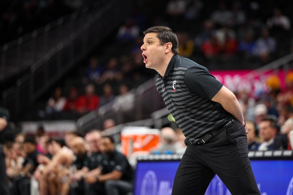 Mar 12, 2025; Kansas City, MO, USA; Cincinnati Bearcats coach Wes Miller reacts to game play during the first half against the Iowa State Cyclones at T-Mobile Center. Mandatory Credit: William Purnell-Imagn Images