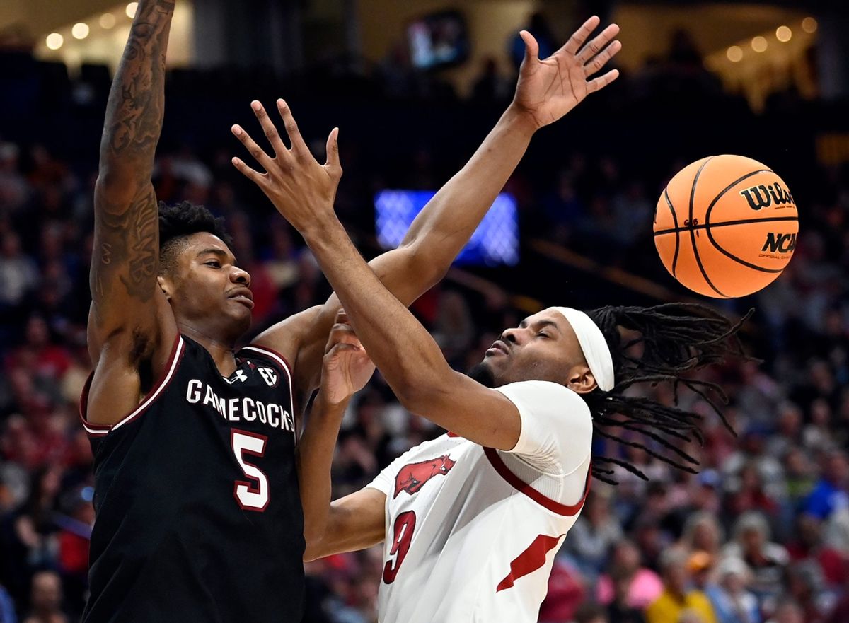 South Carolina forward Nick Pringle (5) and Arkansas forward Jonas Aidoo (9) battle for the ball during a NCAA college basketball first round game at the men’s Southeastern Conference Tournament Wednesday, March 12, 2025, in Nashville, Tenn.