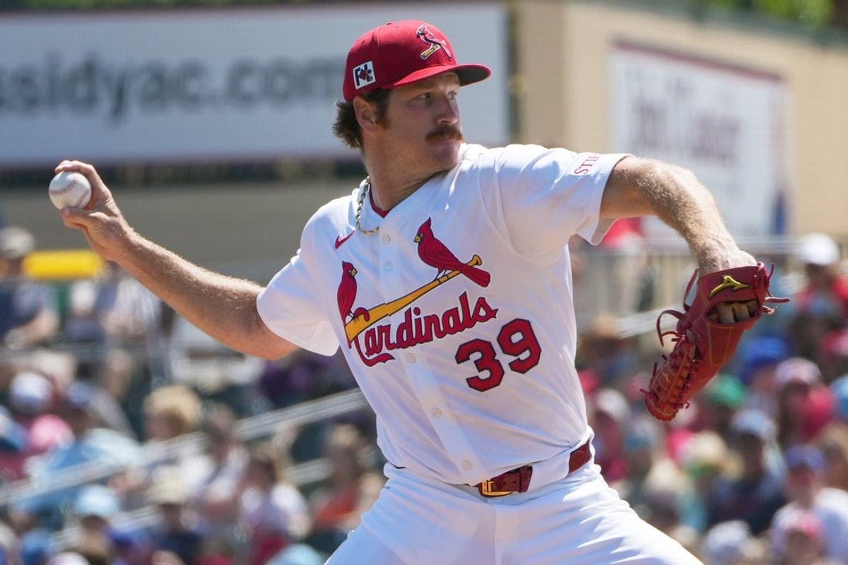 Mar 12, 2025; Jupiter, Florida, USA;  St. Louis Cardinals pitcher Miles Mikolas (39) pitches against the New York Mets in the first inning at Roger Dean Chevrolet Stadium. Mandatory Credit: Jim Rassol-Imagn Images