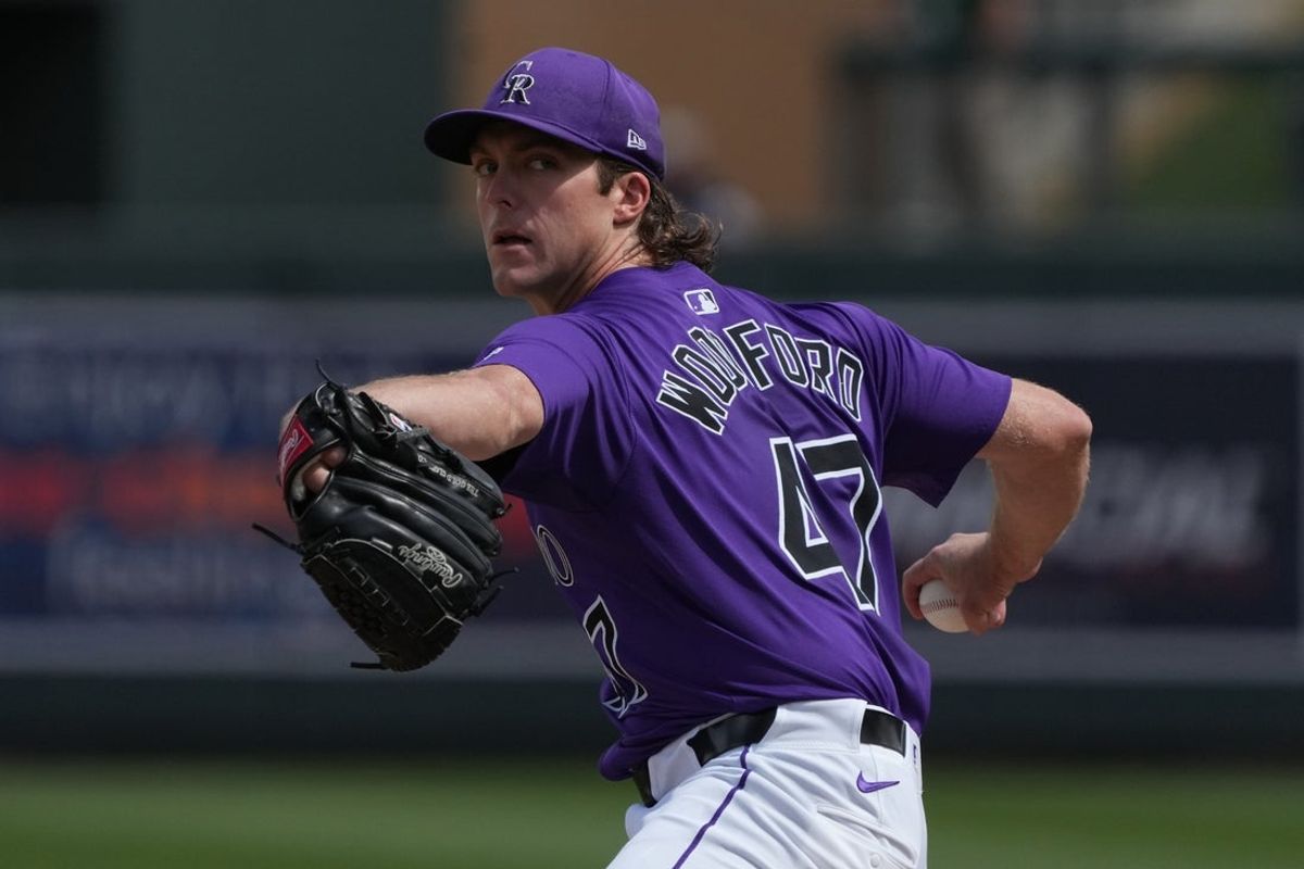 Mar 12, 2025; Salt River Pima-Maricopa, Arizona, USA; Colorado Rockies pitcher Jake Woodford throws against the San Diego Padres in the first inning at Salt River Fields at Talking Stick. Mandatory Credit: Rick Scuteri-Imagn Images