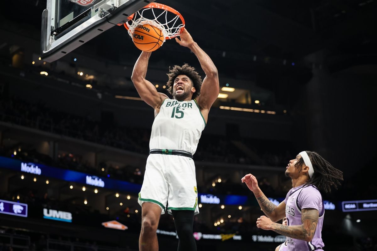 Mar 12, 2025; Kansas City, MO, USA; Baylor Bears forward Norchad Omier (15) dunks during the first half against the Kansas State Wildcats at T-Mobile Center. Mandatory Credit: William Purnell-Imagn Images