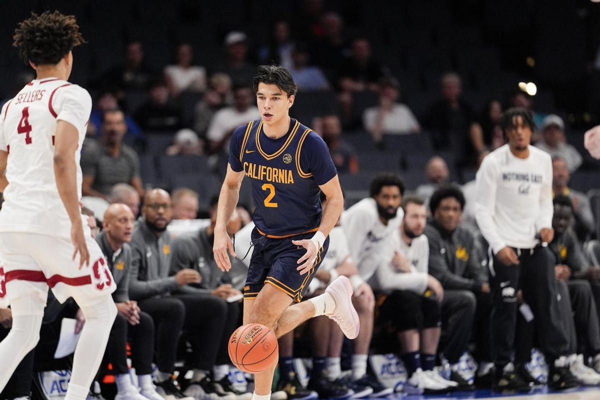 Mar 12, 2025; Charlotte, NC, USA; California Golden Bears guard Andrej Stojakovic (2) brings the ball up court against the Stanford Cardinal during the first half at Spectrum Center. Mandatory Credit: Jim Dedmon-Imagn Images