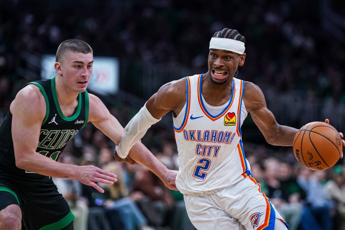 Mar 12, 2025; Boston, Massachusetts, USA; Oklahoma City Thunder guard Shai Gilgeous-Alexander (2) drives the ball against Boston Celtics guard Payton Pritchard (11) in the third quarter at TD Garden. Mandatory Credit: David Butler II-Imagn Images