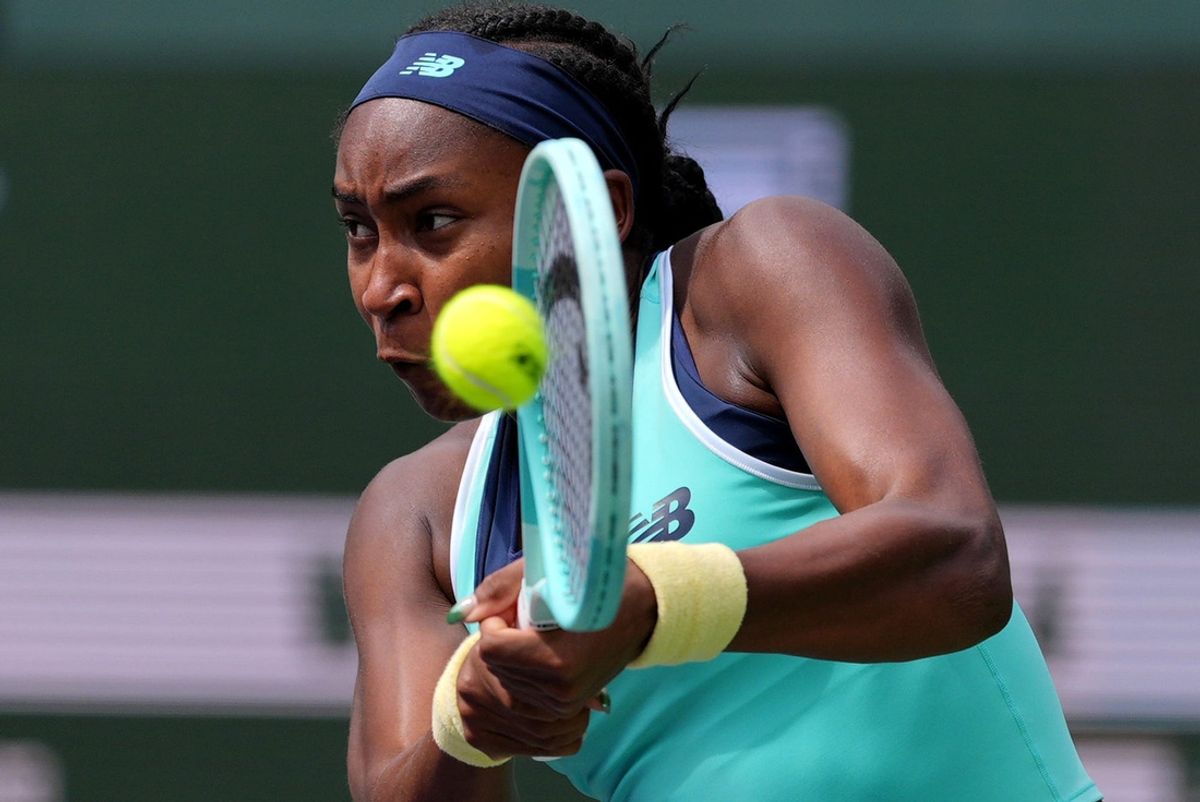 Coco Gauff returns to Belinda Bencic during their fourth-round match on Stadium 1 at the BNP Paribas Open in Indian Wells, Calif., on Wed., March 12, 2025.