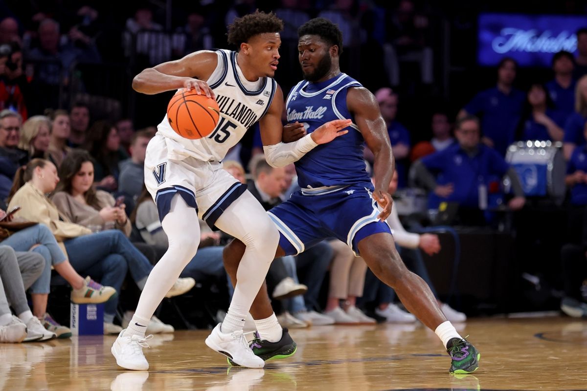 Mar 12, 2025; New York, NY, USA; Villanova Wildcats guard Jordan Longino (15) controls the ball against Seton Hall Pirates guard Dylan Addae-Wusu (0) during the first half at Madison Square Garden. Mandatory Credit: Brad Penner-Imagn Images