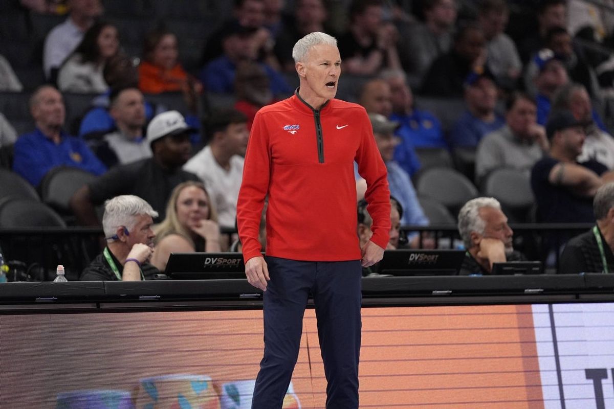 Mar 12, 2025; Charlotte, NC, USA; Southern Methodist Mustangs head coach Andy Enfield during the first half against the Syracuse Orange at Spectrum Center. Mandatory Credit: Jim Dedmon-Imagn Images