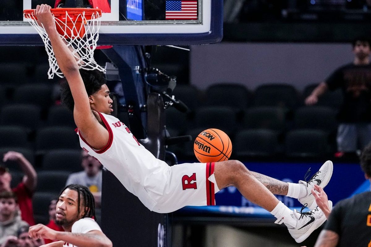 Rutgers Scarlet Knights guard Dylan Harper (2) dunks the ball Wednesday, March 12, 2025, in a first round game at the 2025 TIAA Big Ten Men’s Basketball Tournament between the USC Trojans and the Rutgers Scarlet Knights at Gainbridge Fieldhouse in Indianapolis. The USC Trojans defeated the Rutgers Scarlet Knights, 97-89.