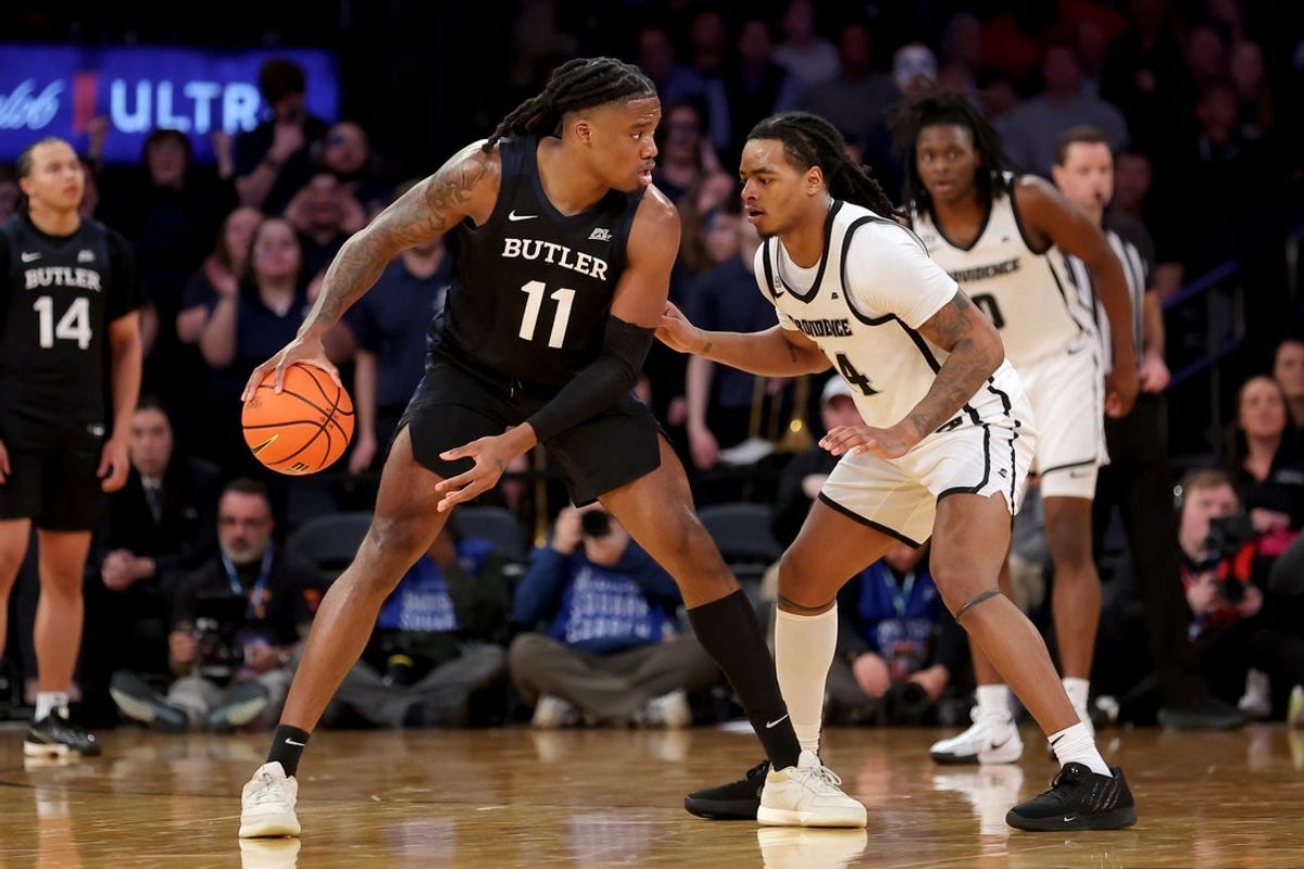 Mar 12, 2025; New York, NY, USA; Butler Bulldogs forward Jahmyl Telfort (11) controls the ball against Providence Friars guard Corey Floyd Jr. (14) during the second half at Madison Square Garden. Mandatory Credit: Brad Penner-Imagn Images